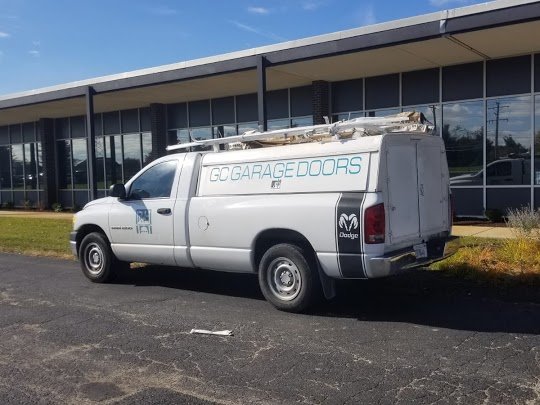 GC GARAGE DOORS CORP logo
